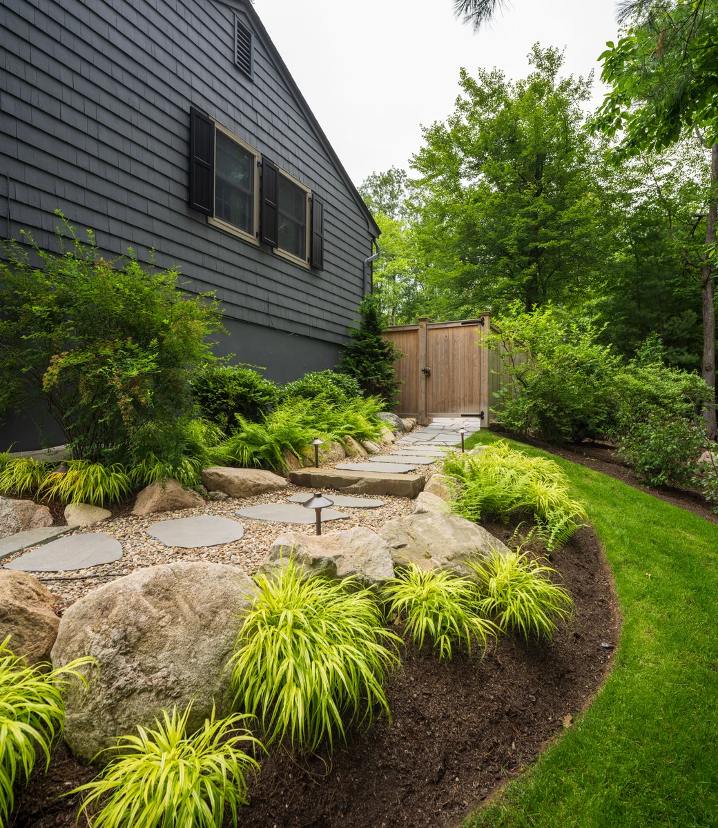 fine gardening and design with a walkway and mulch