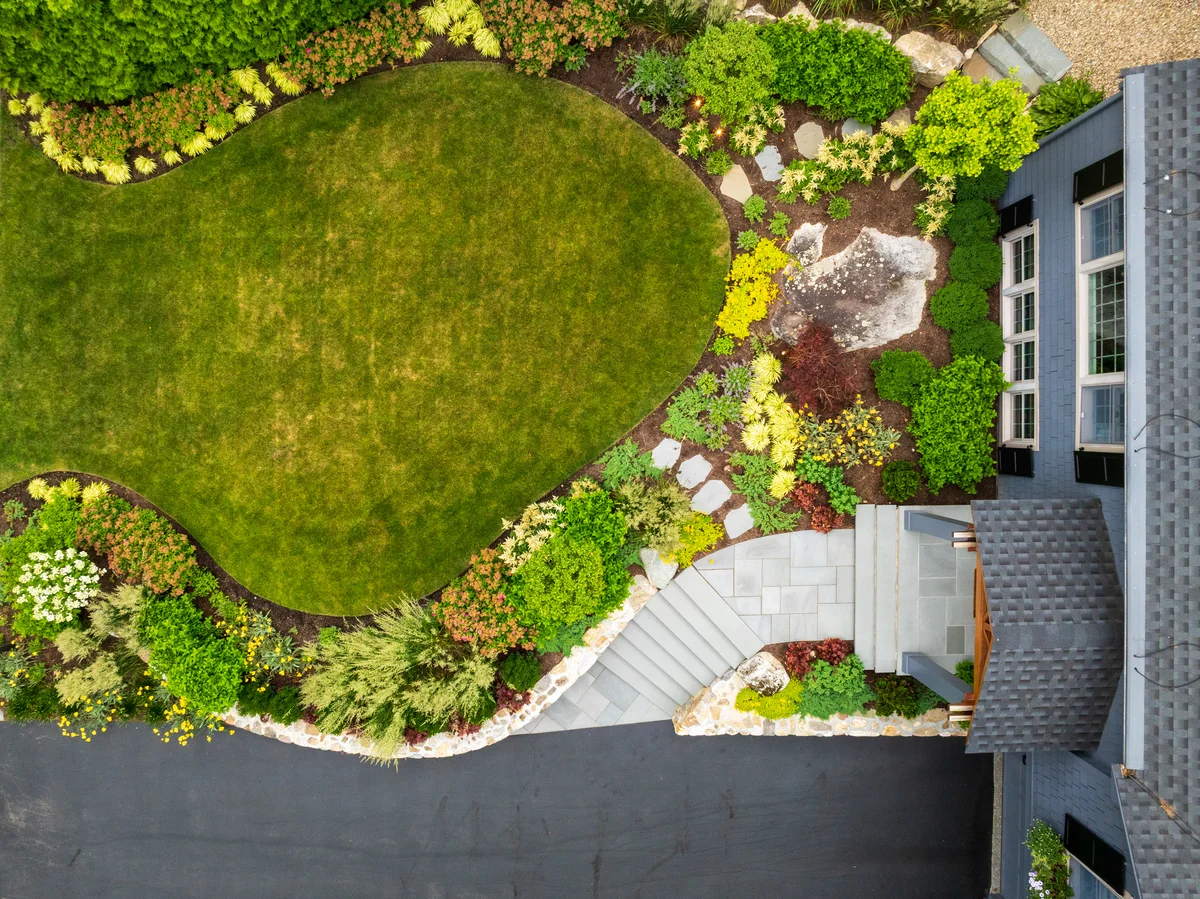 aerial view of front yard landscaped by Lynch Landscape & Tree Service in Sudbury, MA